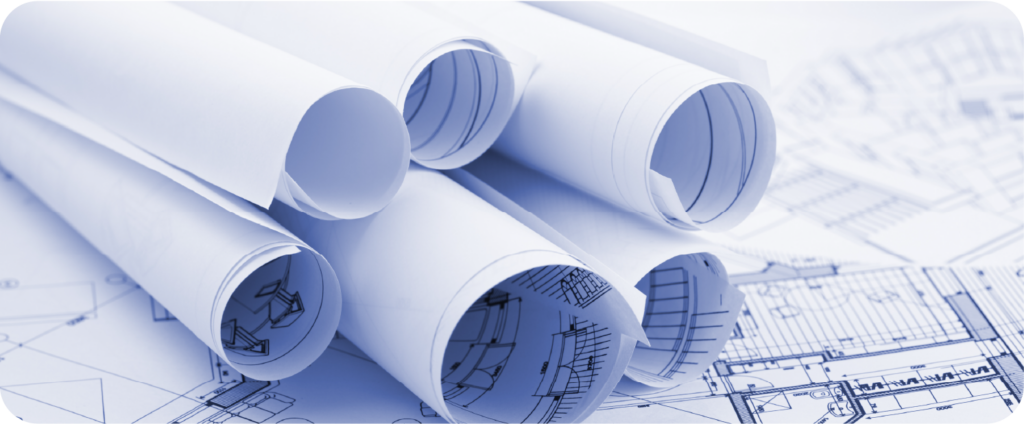 Rolled architectural blueprints for imaging facility design